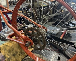 Respoked and trued 40 spoke rear wheel with complete hub assembly fitted to the frame.